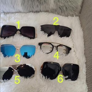 Sunglasses new with litters scratches no return no